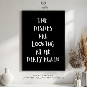 Bold framed quote print The Dishes Are Looking At Me Dirty Again, combining minimalism with a sense of humor or edge