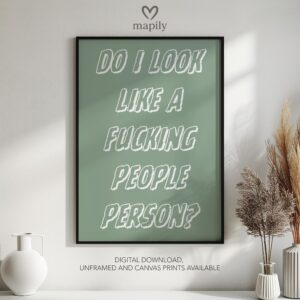 Minimalist black framed wall art print featuring bold typography and a stylish design Do I Look Like