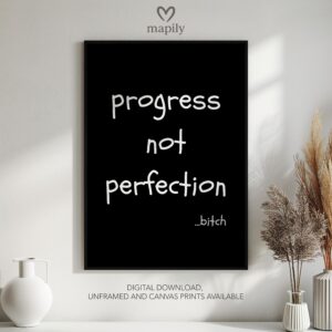 Modern framed wall art piece featuring a simple yet elegant design Progress Not Perfection, suited for any interior style