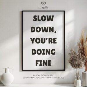 Modern framed wall art piece featuring a simple yet elegant design Slow Down, suited for any interior style