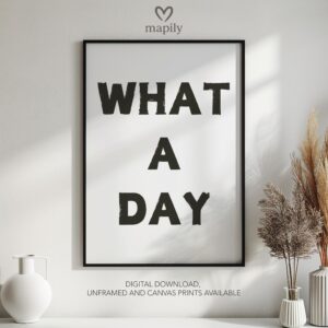 Simple and striking black and white quote print What A Day, designed for effortless styling